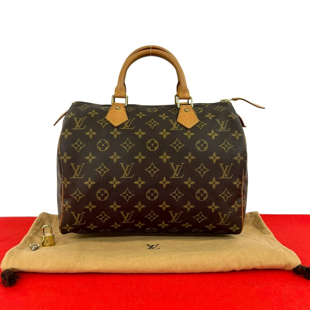 LOUIS VUITTON ルイヴィトン (Vintage) スピーディ 30 ハンドバッグ – Trip LOUIS VUITTON ルイヴィトン (Vintage) スピーディ 30 ハンドバッグ – Trip
