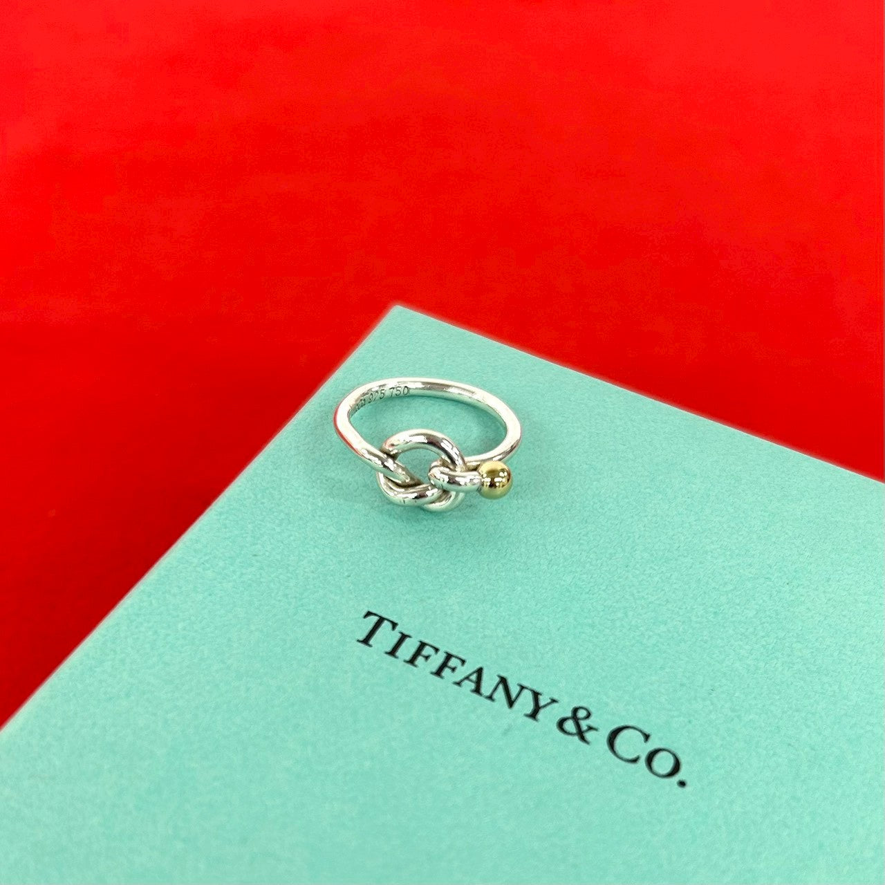 ティファニー　14.5号　ラブノット　リング　シルバー925×K18 TIFFANY&Co. ティファニー ラブノット 925 K18 750YG リング 指輪 – Trip