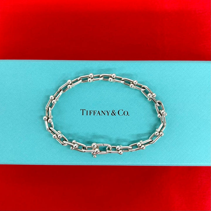 blurRubbingTiffany Hardware Small Link