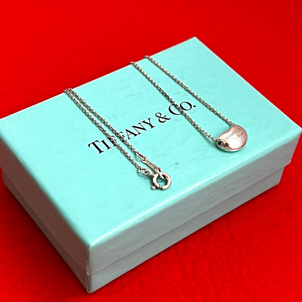 TIFFANY& Co.ティファニー ビーン ネックレス 巾着、外箱美品付き TIFFANY&Co. ティファニー ビーン ネックレス – Trip