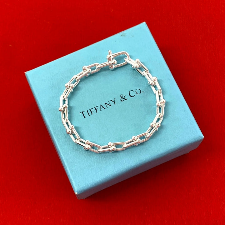 blurRubbingTiffany Hardware Small Link